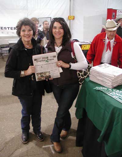 Both enthusiastic readers of the Capital Press.  Feed store owner Marsha Bucke (left) is joined by her daughter Trisha Nissen.